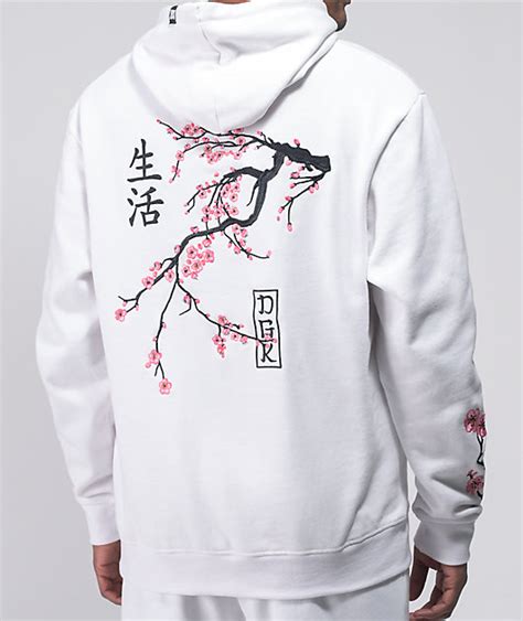The pink and white blooms of the cherry blossom tree often herald the arrival of spring. . Dgk cherry blossom hoodie